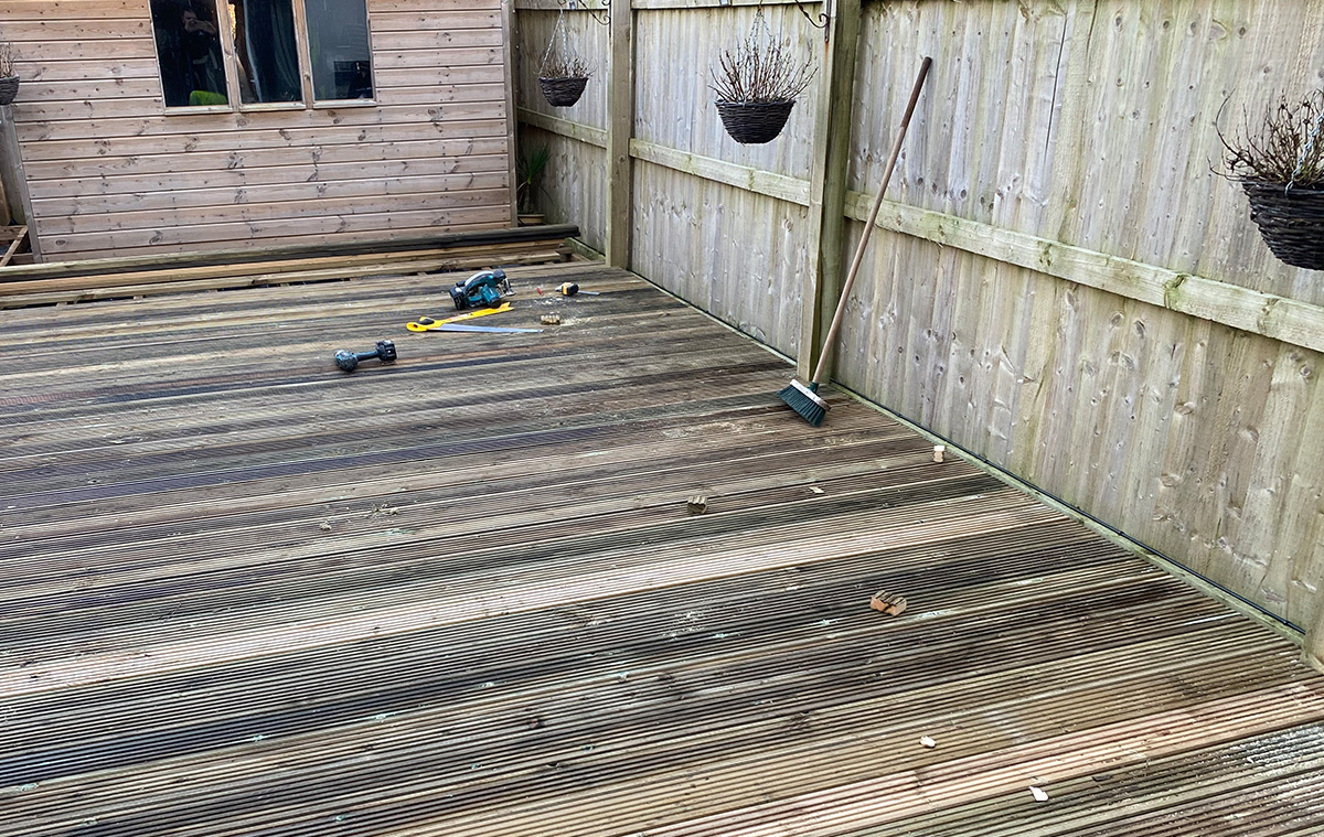 Garden decking and boundary fencing and gate fitted by St Ives Fencing Services
